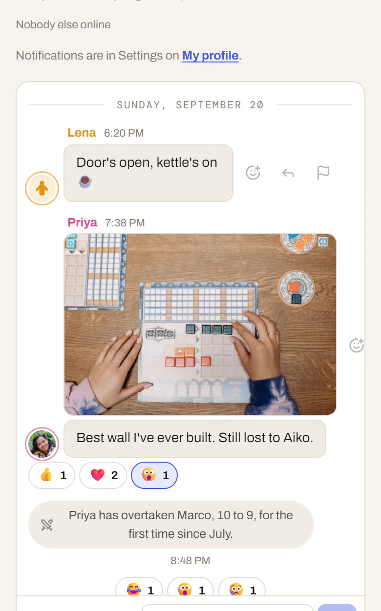 The group chat: a photo from game night with reactions, and a note that Priya has overtaken Marco